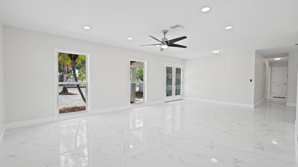 1024 Spindle Palm Way Apollo Beach, FL 33572 - Photo 20 of 50 a view of an empty room with a window