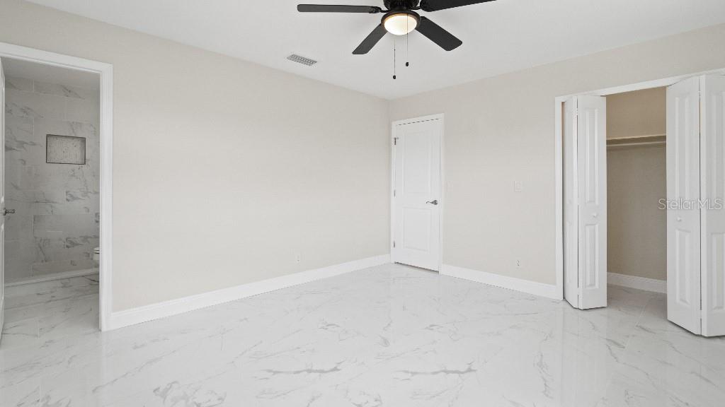 1024 Spindle Palm Way Apollo Beach, FL 33572 - Photo 37 of 50 a view of an empty room