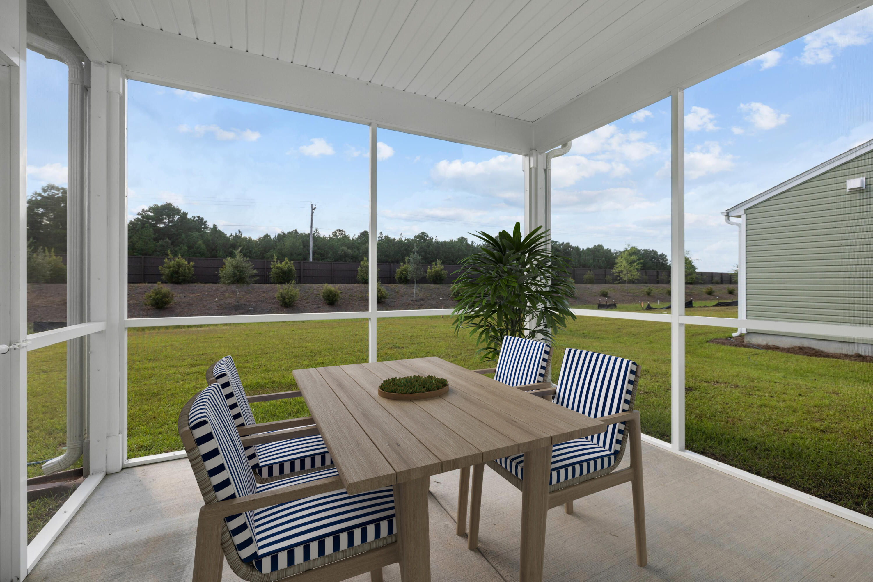 470 White Magnolia Street Moncks Corner, SC 29461 - Photo 13 of 20 Cottonwood Screened Porch