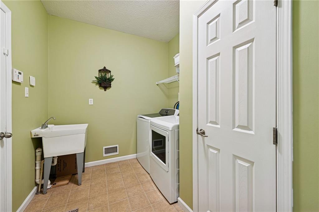 504 Azalea Lane Bridgeville, PA 15017 - Photo 17 of 34 First floor laundry