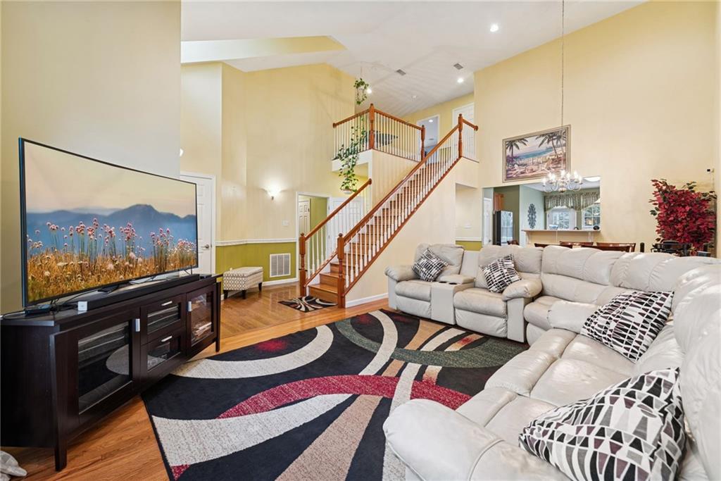 504 Azalea Lane Bridgeville, PA 15017 - Photo 5 of 34 Living Room with views to dinning room and kitchen