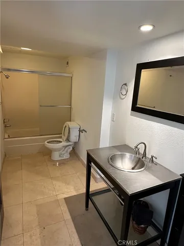 a view of balcony with furniture