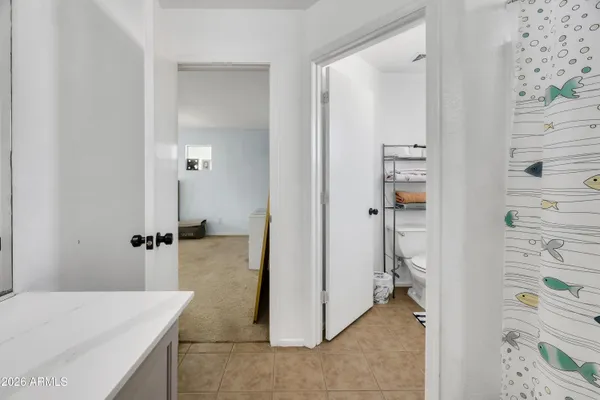 a view of a bathroom from a en suite bathroom