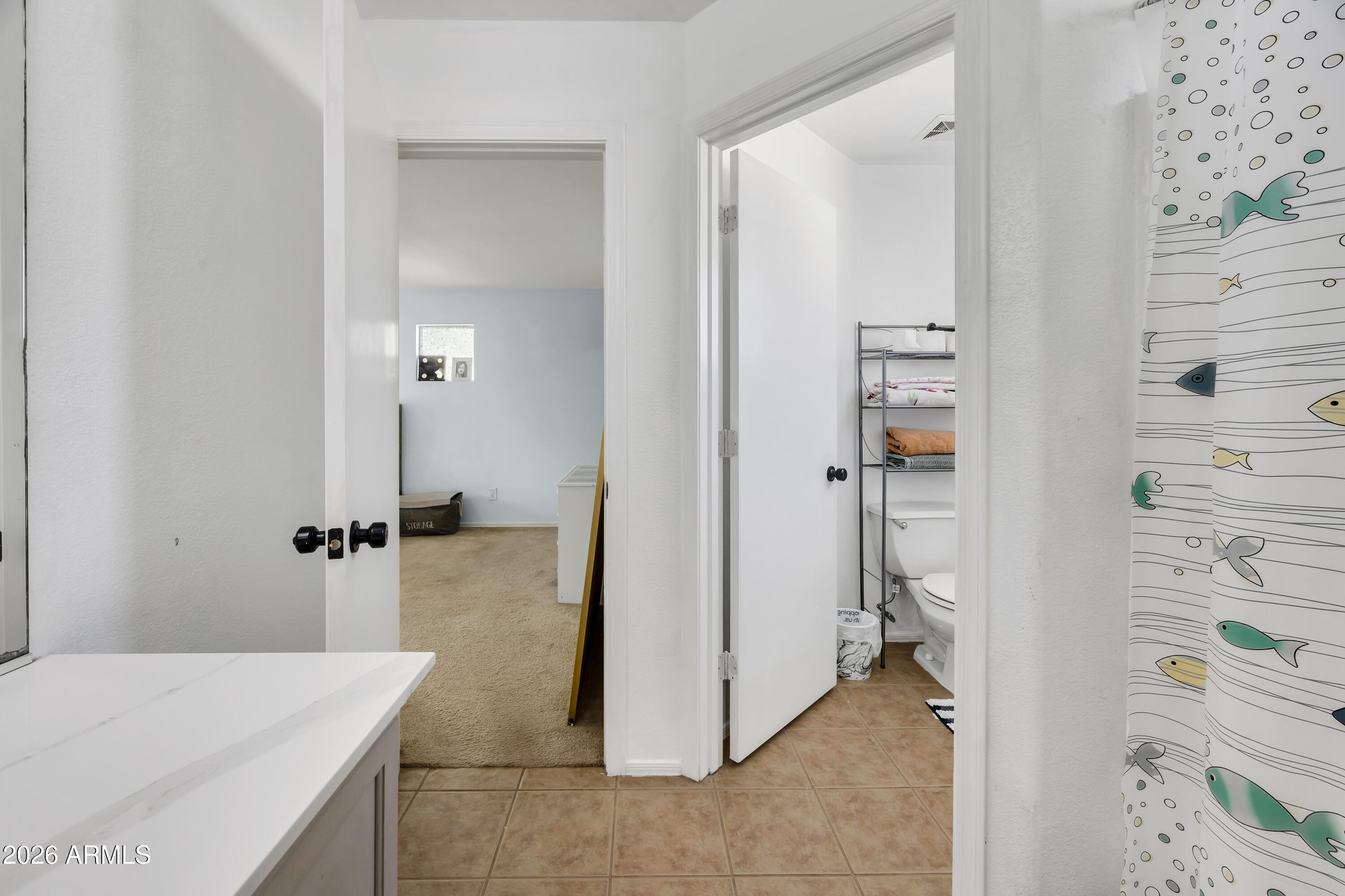 1430 East Romley Road Phoenix, AZ 85040 - Photo 19 of 24 a view of a bathroom from a en suite bathroom