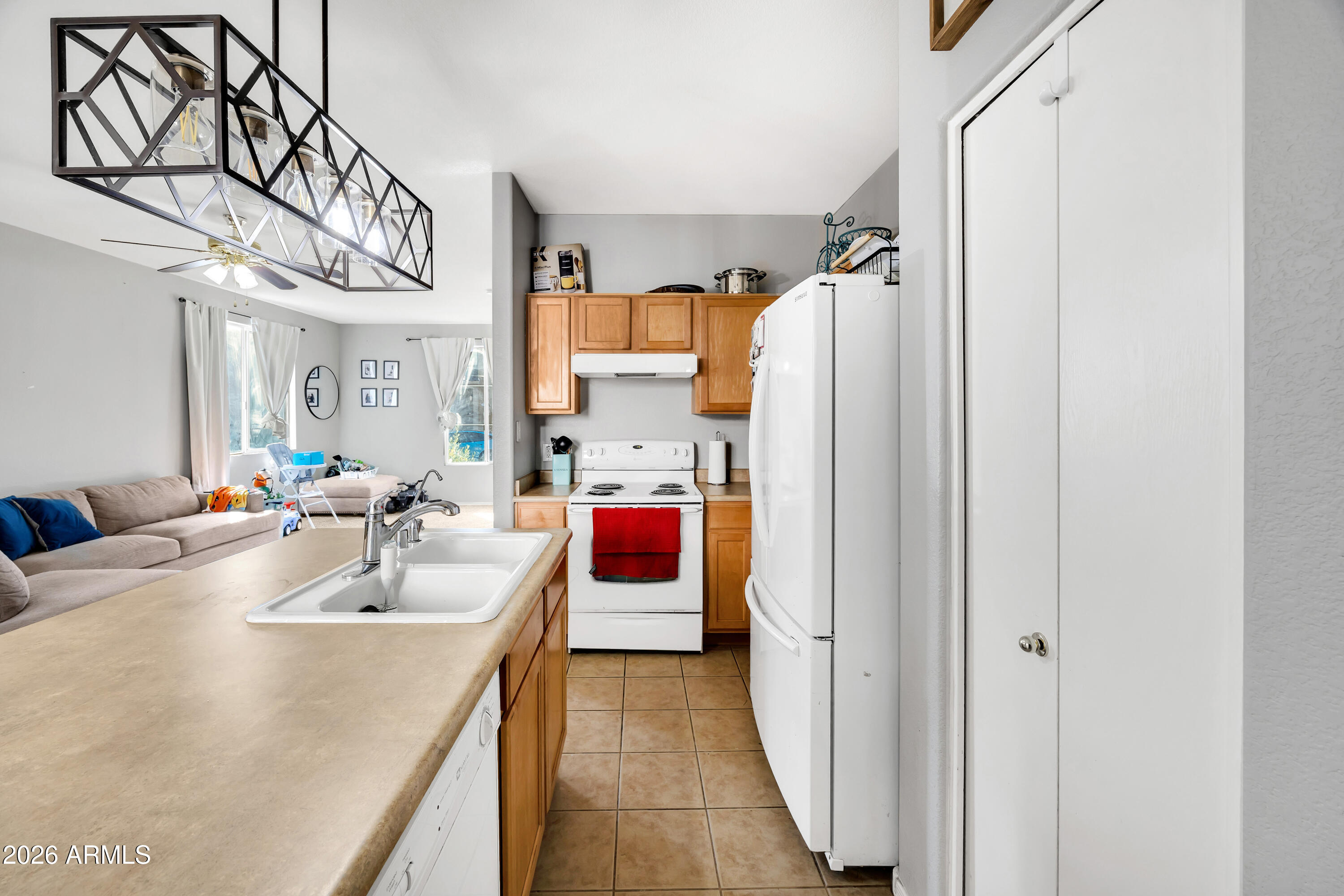 1430 East Romley Road Phoenix, AZ 85040 - Photo 10 of 24 a bathroom with a sink and mirror
