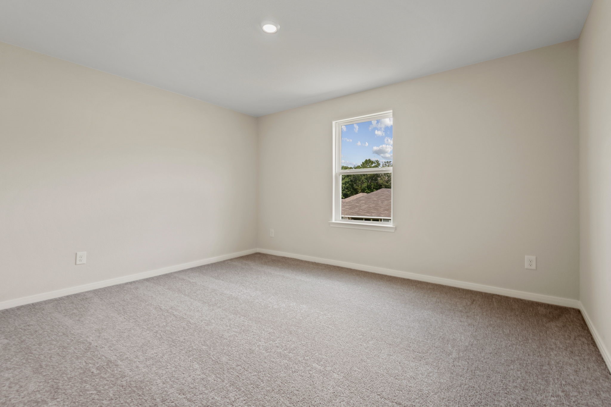 10339 Red Cardinal Drive Cleveland, TX 77328 - Photo 16 of 25 an empty room with a window