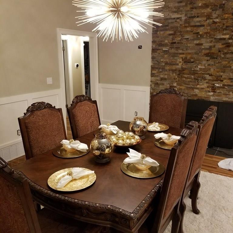 12 Hemlock Road Boxford, MA 01921 - Photo 17 of 42 a dining room with furniture and wooden floor