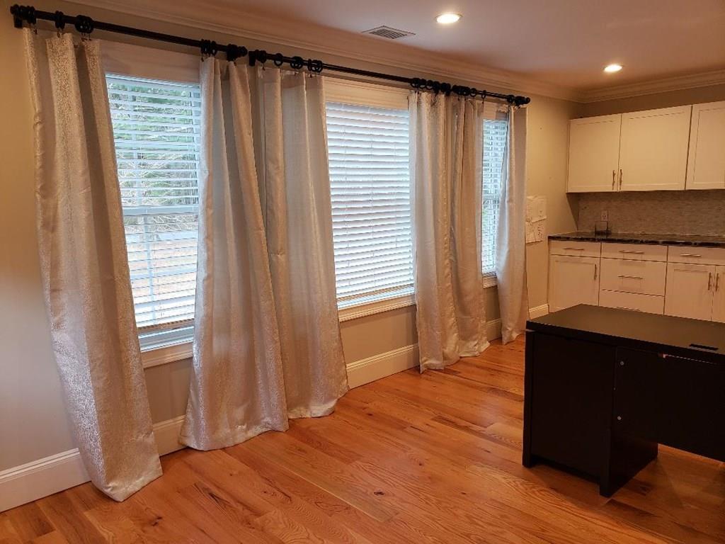 12 Hemlock Road Boxford, MA 01921 - Photo 35 of 42 a kitchen with granite countertop wooden cabinets and a sink