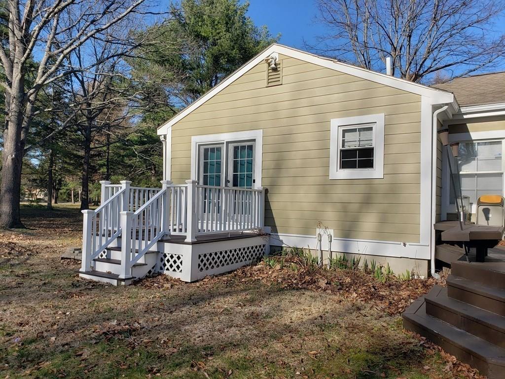 12 Hemlock Road Boxford, MA 01921 - Photo 5 of 42 a view of a house with a yard