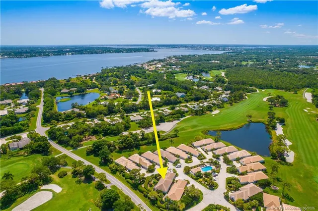 a view of a lake with a yard