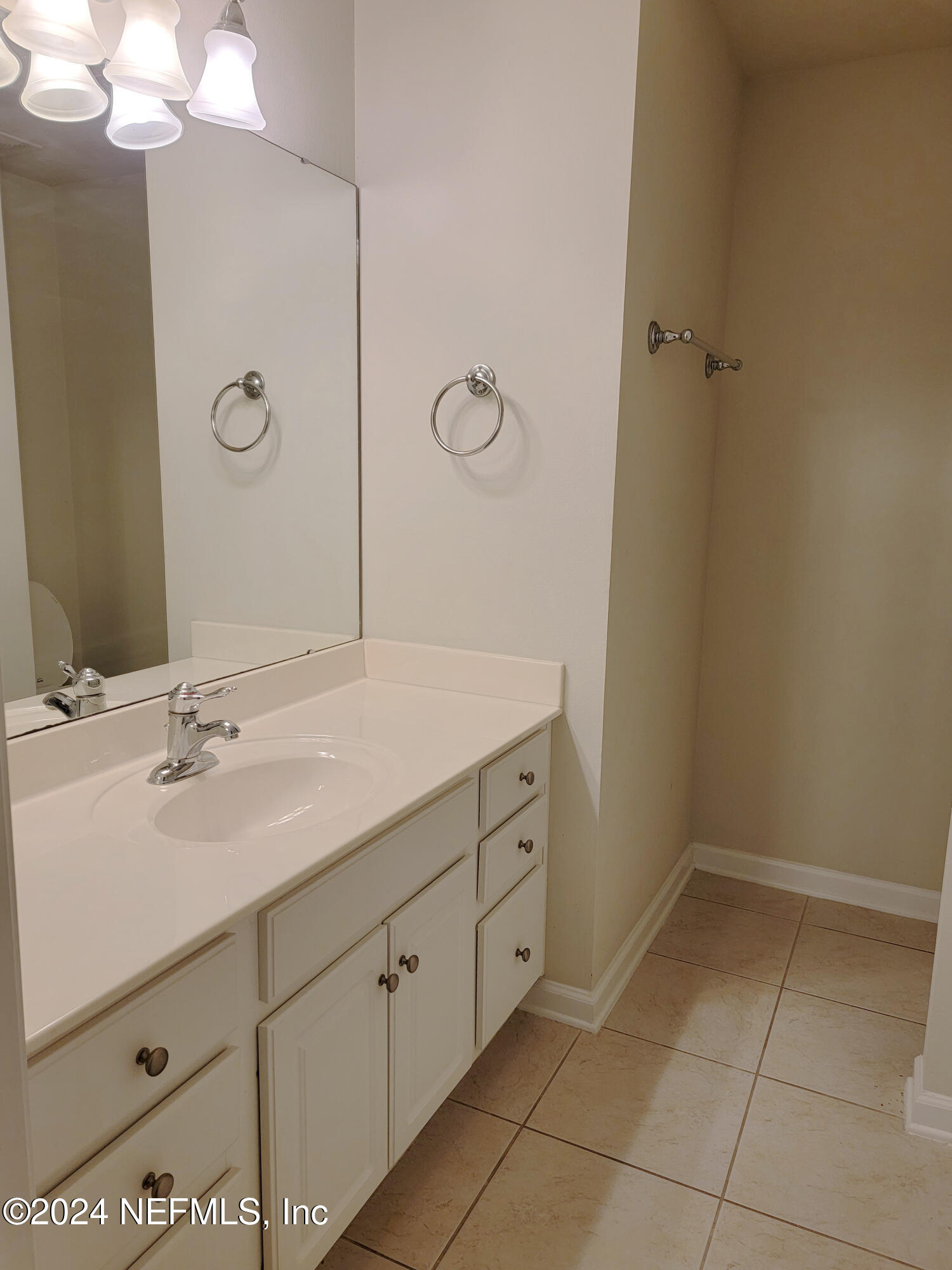 6801 Arching Branch Circle Jacksonville, FL 32258 - Photo 9 of 14 a bathroom with a double vanity sink mirror and vanity