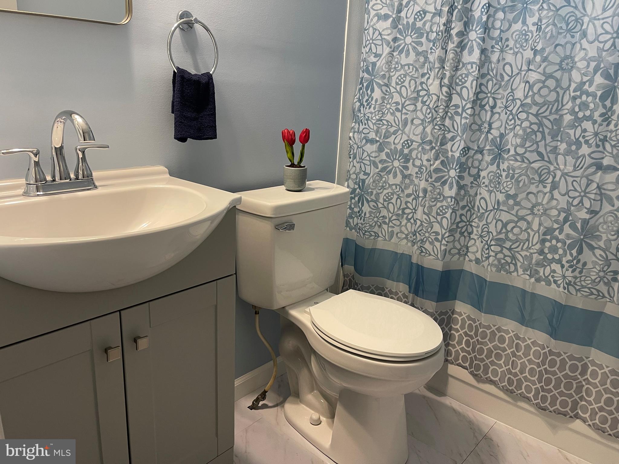 4217 Sugar Run Road Millerstown, PA 17062 - Photo 6 of 19 a bathroom with a sink a toilet and a mirror