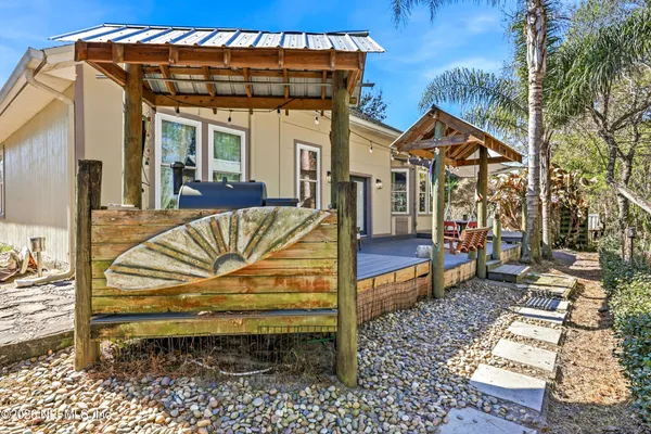 a front view of a house with swimming pool