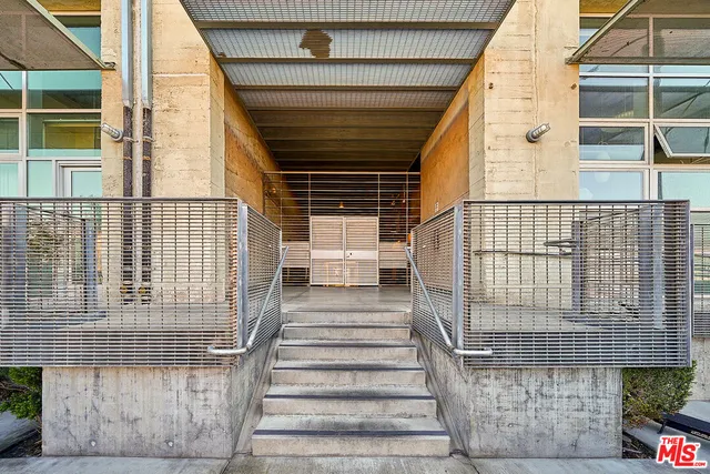 a view of entryway with wooden door