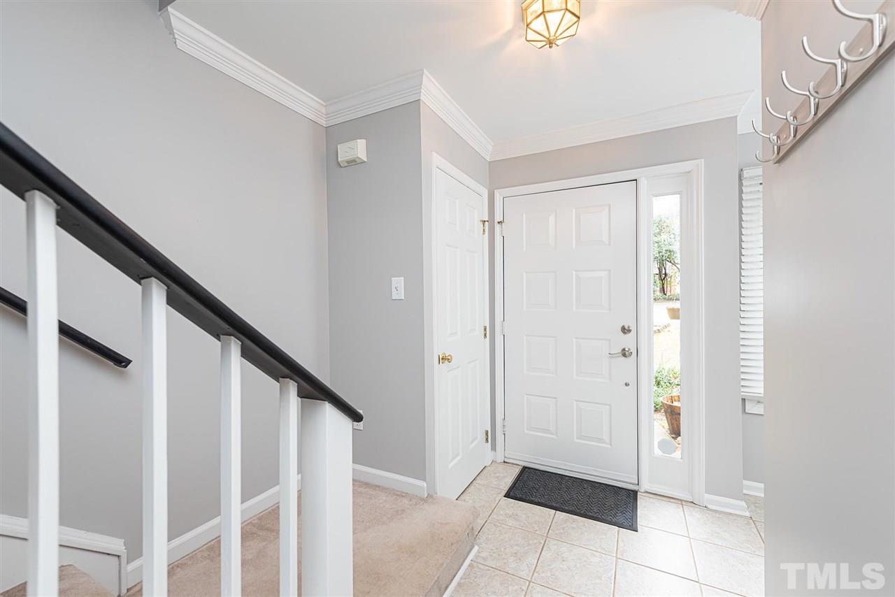 6305 Daystar Lane Raleigh, NC 27613 - Photo 2 of 19 a view of entryway with stairs