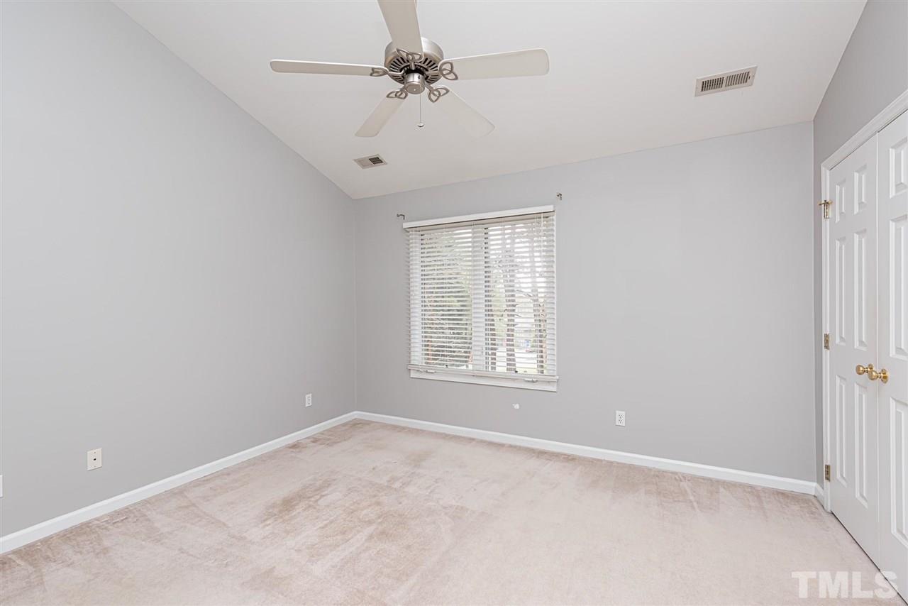 6305 Daystar Lane Raleigh, NC 27613 - Photo 13 of 19 a view of an empty room with a window