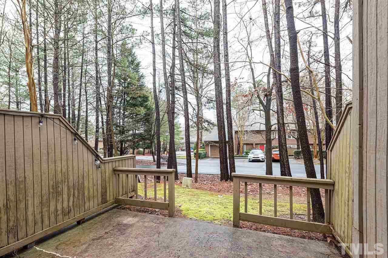 6305 Daystar Lane Raleigh, NC 27613 - Photo 17 of 19 a view of an chairs and deck in the house