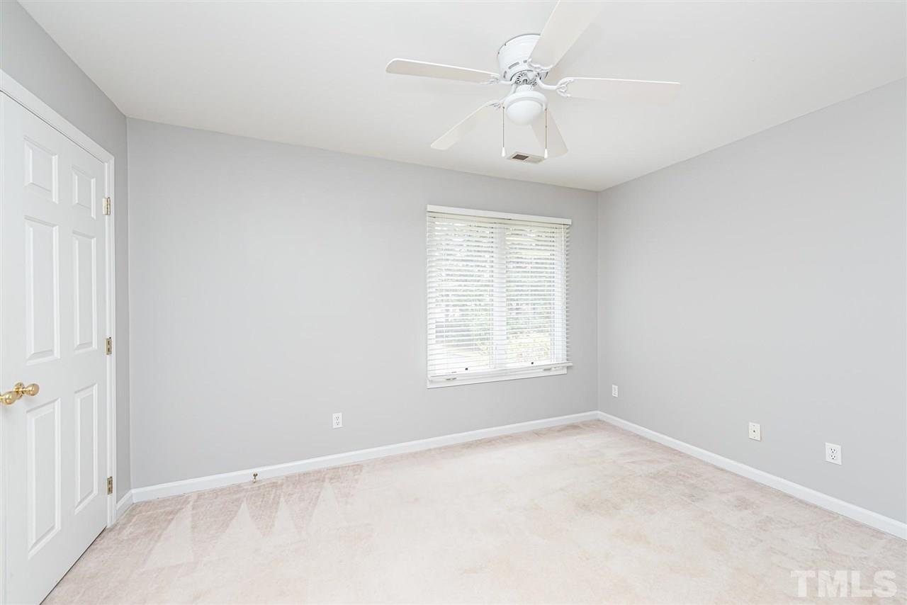 6305 Daystar Lane Raleigh, NC 27613 - Photo 9 of 19 an empty room with a window