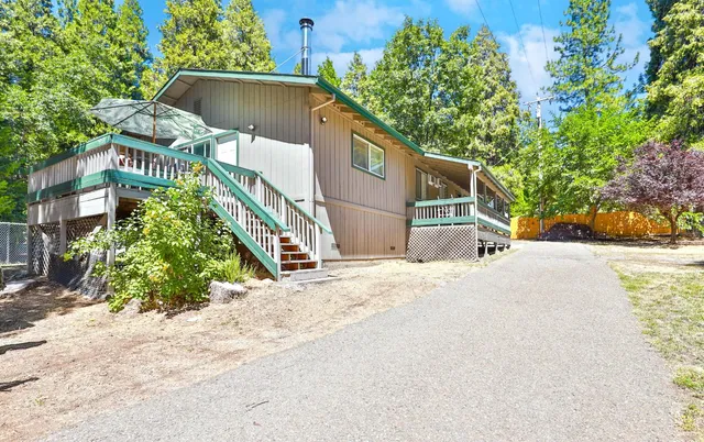 a house with a tree in the background