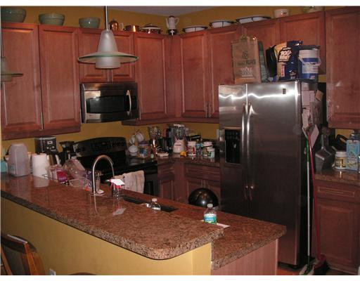 643 Northwest 38th Circle, Unit 643 Boca Raton, FL 33431 - Photo 3 of 6 Kitchen