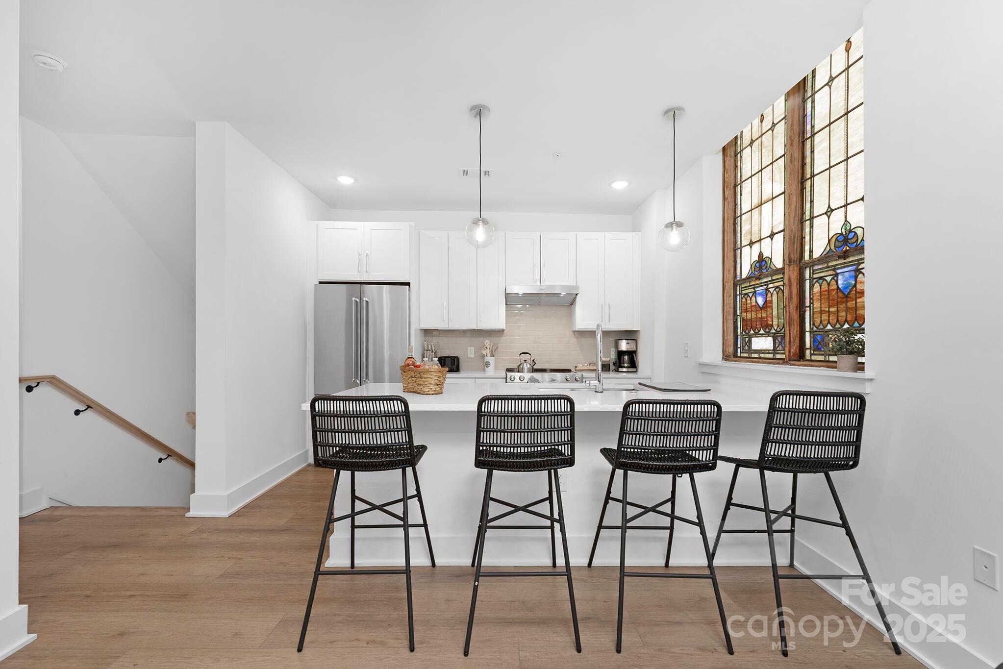 201 Grandin Road, Unit 13 Charlotte, NC 28208 - Photo 11 of 25 a view of a dining room with furniture