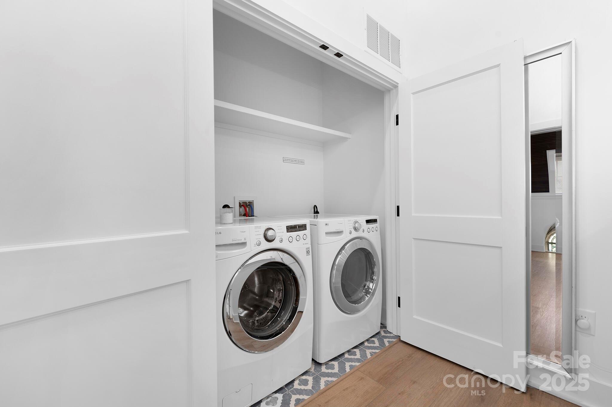 201 Grandin Road, Unit 13 Charlotte, NC 28208 - Photo 21 of 25 a utility room with dryer and washer
