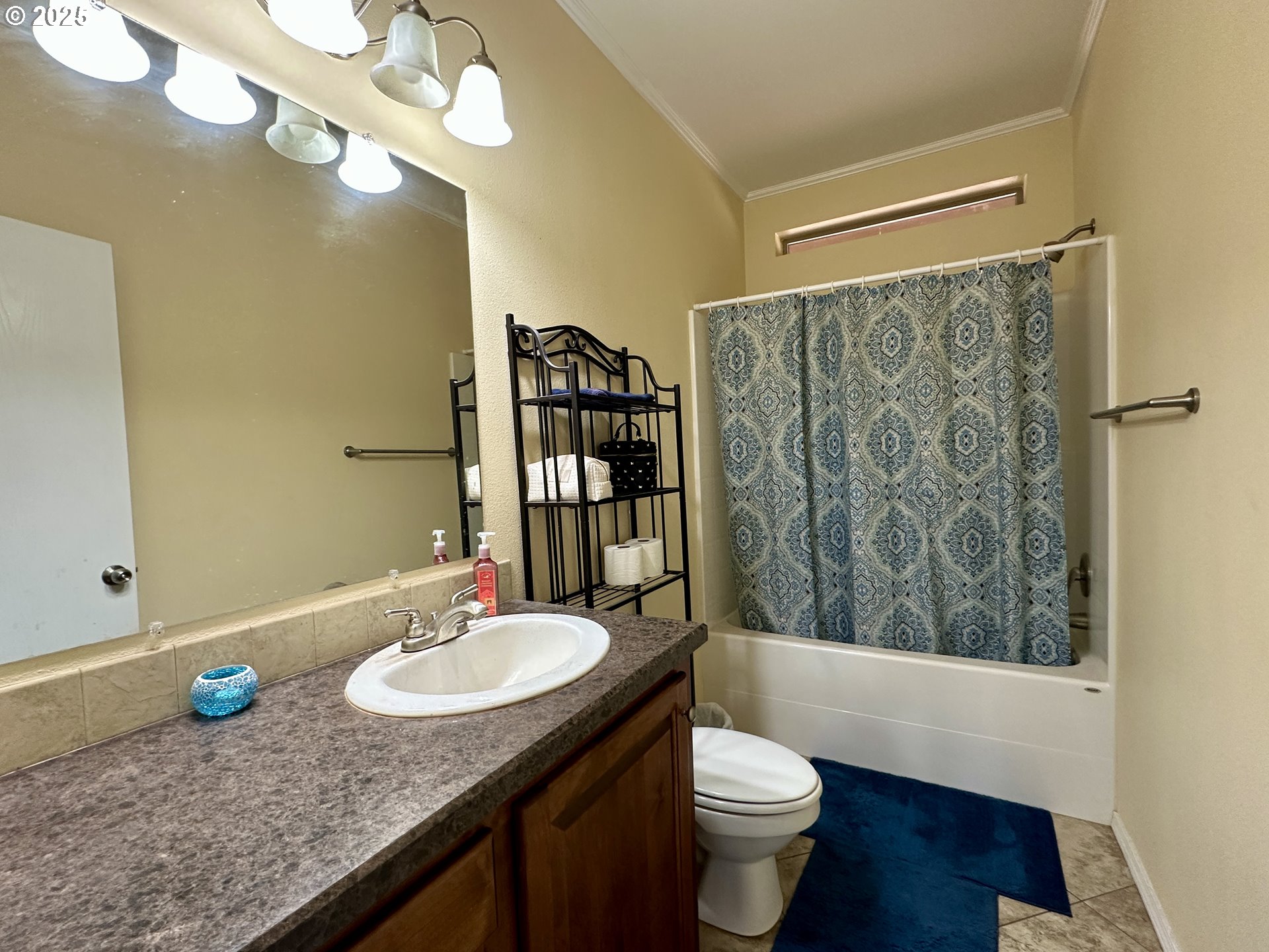 48144 East Pine Creek Road Halfway, OR 97834 - Photo 16 of 48 a bathroom with a granite countertop sink and a mirror