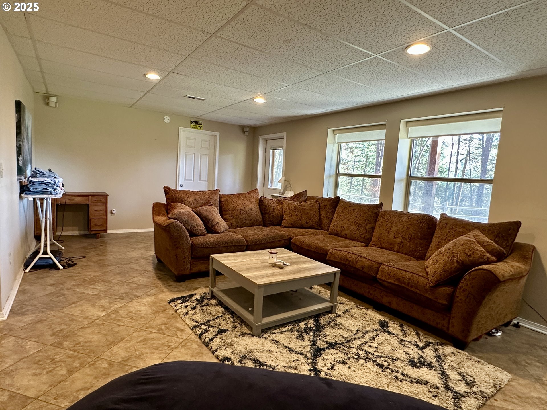48144 East Pine Creek Road Halfway, OR 97834 - Photo 21 of 48 a living room with furniture a rug and a window