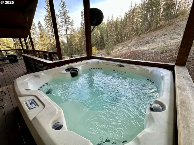 a view of a balcony with furniture