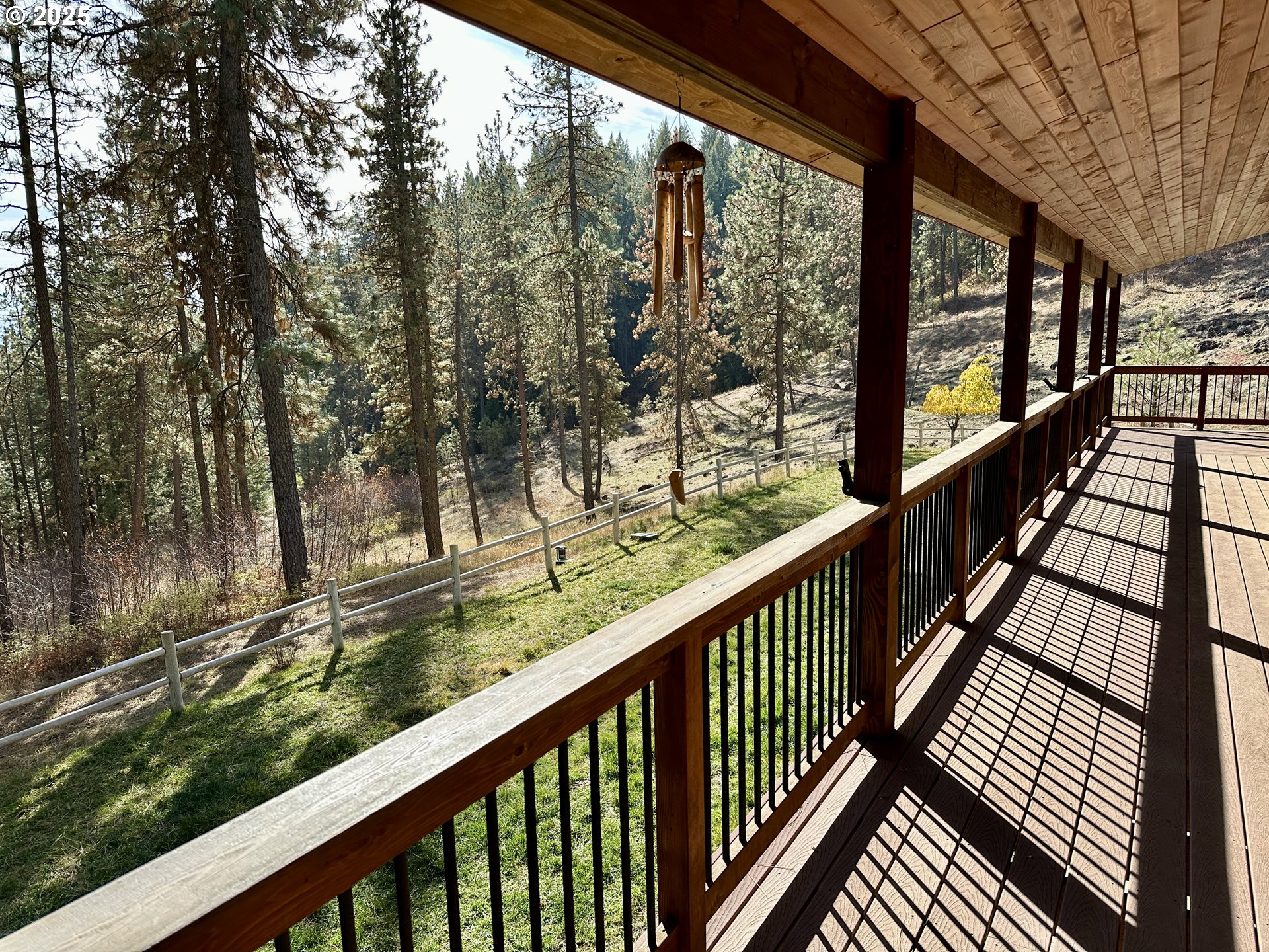 48144 East Pine Creek Road Halfway, OR 97834 - Photo 26 of 48 a view of a balcony with wooden floor