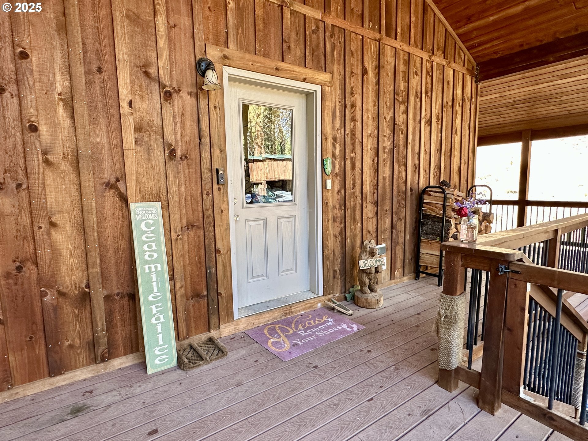 48144 East Pine Creek Road Halfway, OR 97834 - Photo 3 of 48 a view of an entryway with wooden floor and stairs