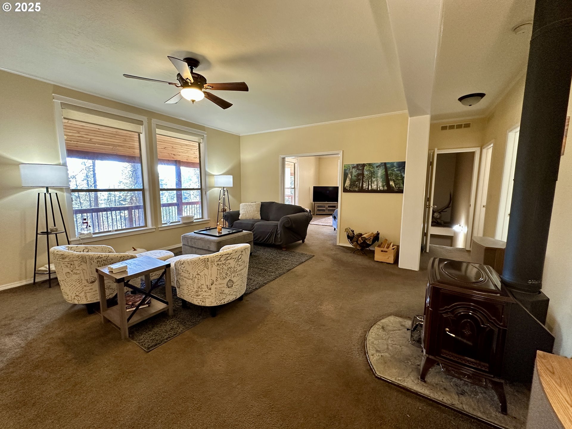 48144 East Pine Creek Road Halfway, OR 97834 - Photo 7 of 48 a living room with furniture and a flat screen tv