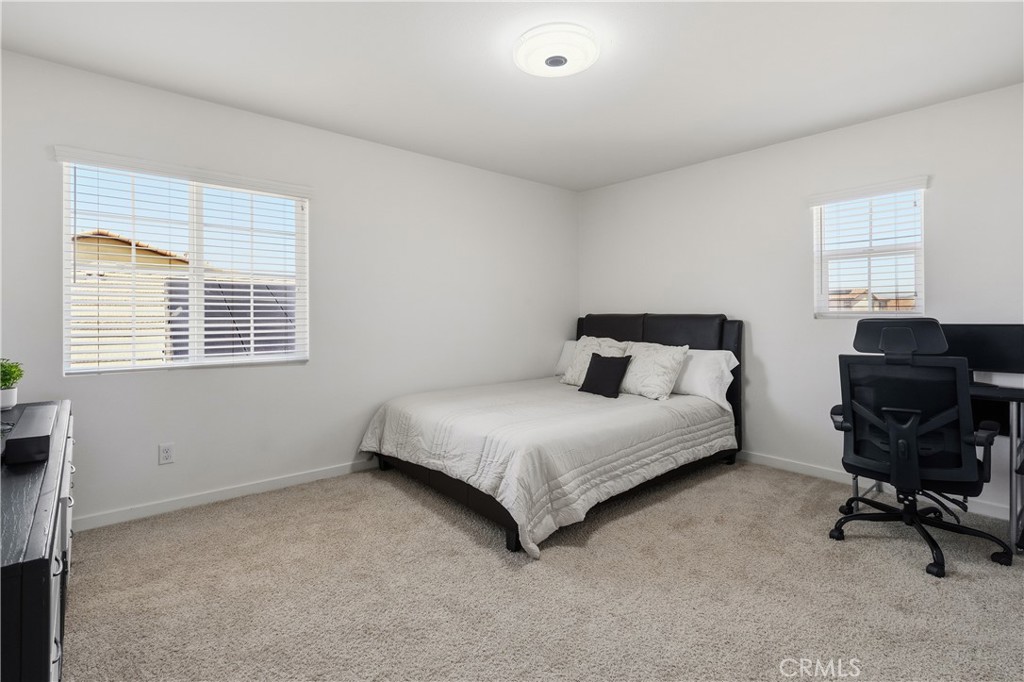 34727 Ribbon Grass Way Murrieta, CA 92563 - Photo 17 of 54 Secondary upstairs bedroom #1 with ample natural light