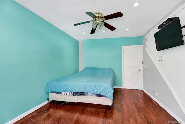 a living room with a flat screen tv and a fireplace
