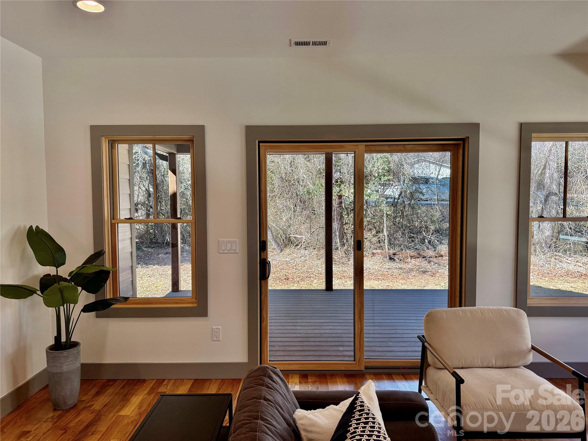 314 Gallimore Road Brevard, NC 28712 - Photo 13 of 38 a living room with furniture and a window