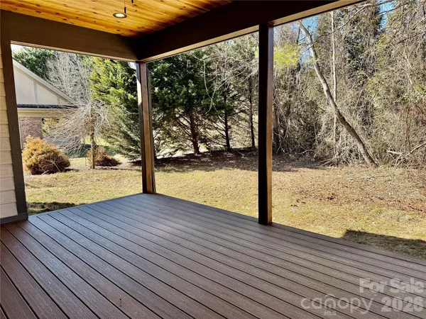 a view of a pathway to a yard