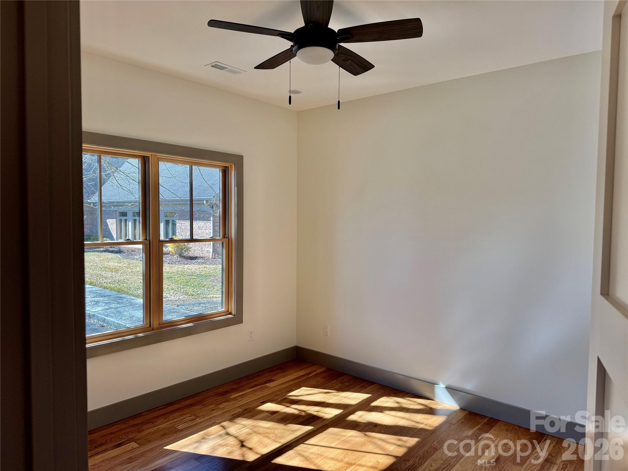 314 Gallimore Road Brevard, NC 28712 - Photo 31 of 38 a view of a room with a window and ceiling fan
