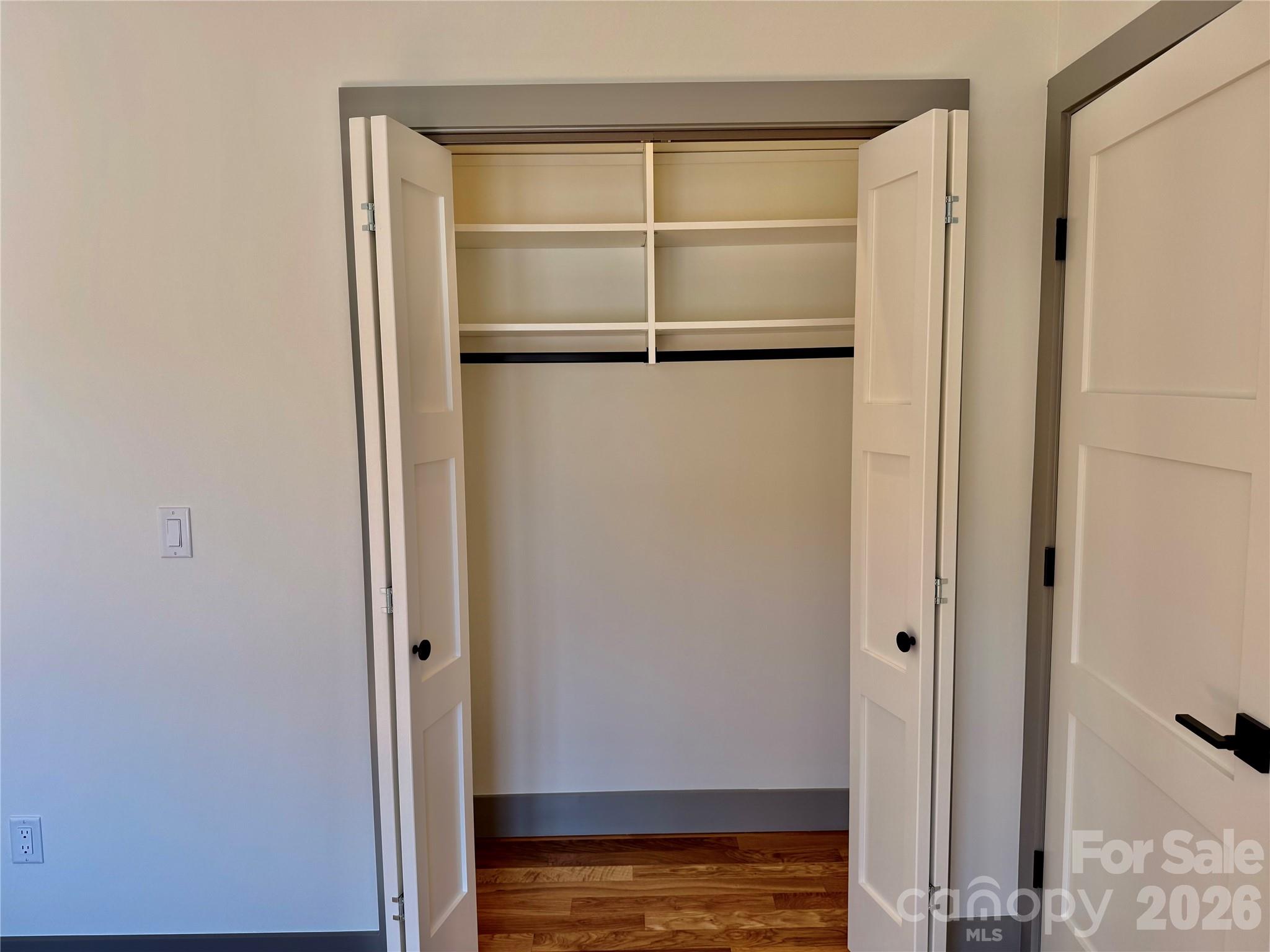 314 Gallimore Road Brevard, NC 28712 - Photo 32 of 38 a view of a room with wooden floor and a window