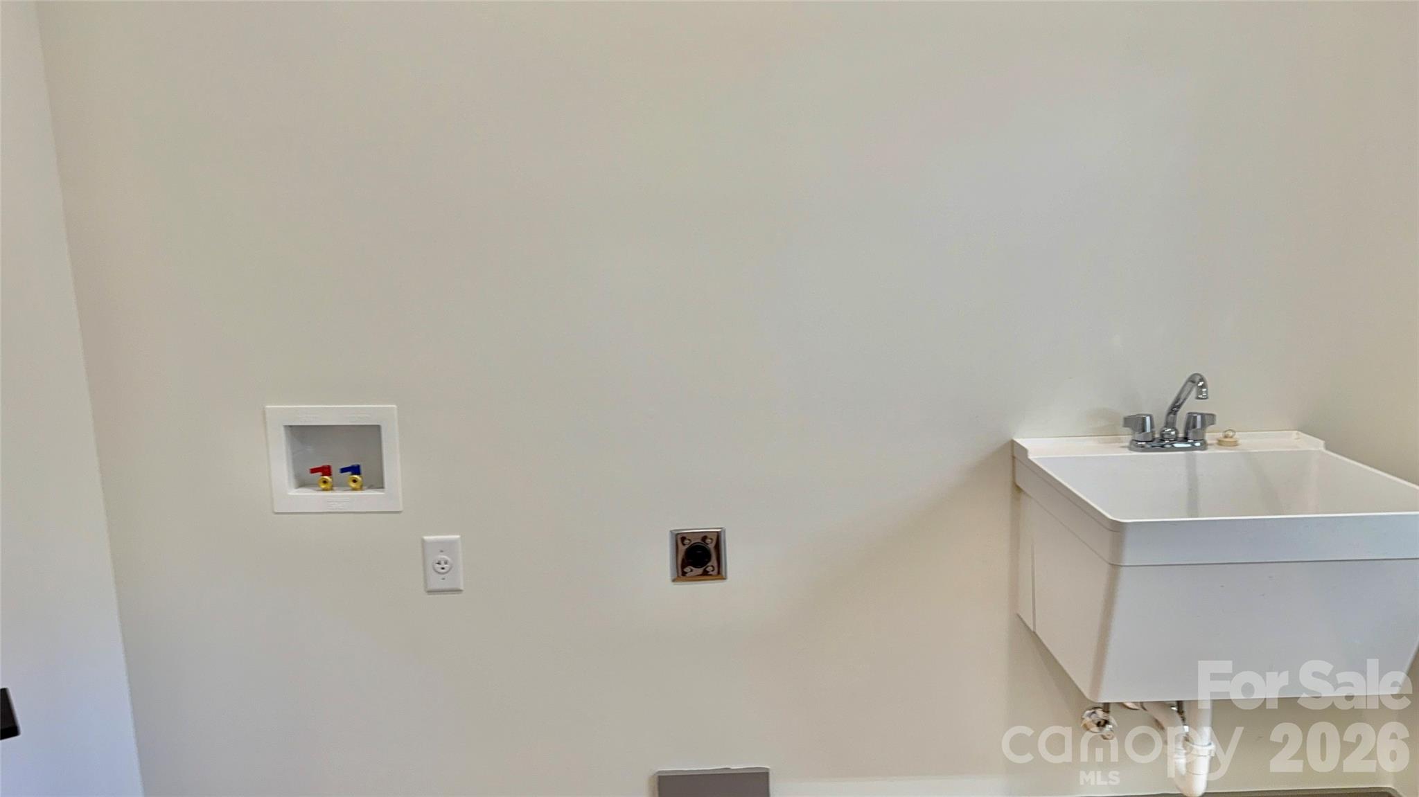 314 Gallimore Road Brevard, NC 28712 - Photo 33 of 38 a bathroom with a sink and mirror