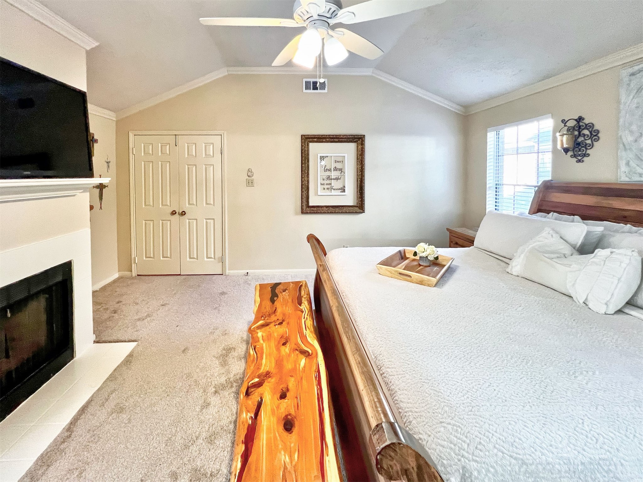 12510 Millvan Drive Houston, TX 77070 - Photo 12 of 46 a bedroom with a bed and a flat screen tv