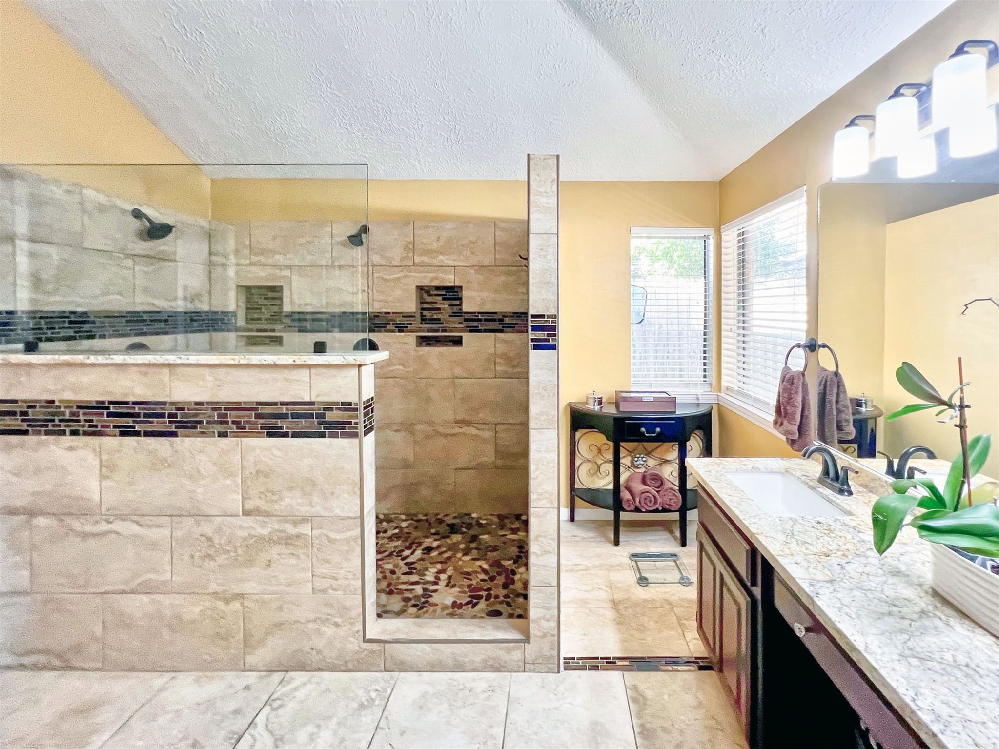 12510 Millvan Drive Houston, TX 77070 - Photo 18 of 46 a living room with furniture and a floor to ceiling window