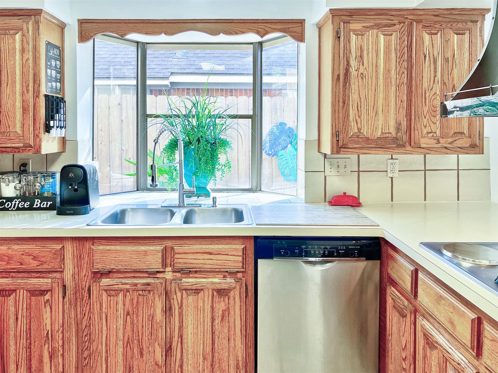 12510 Millvan Drive Houston, TX 77070 - Photo 24 of 46 a kitchen with stainless steel appliances granite countertop a sink and a window