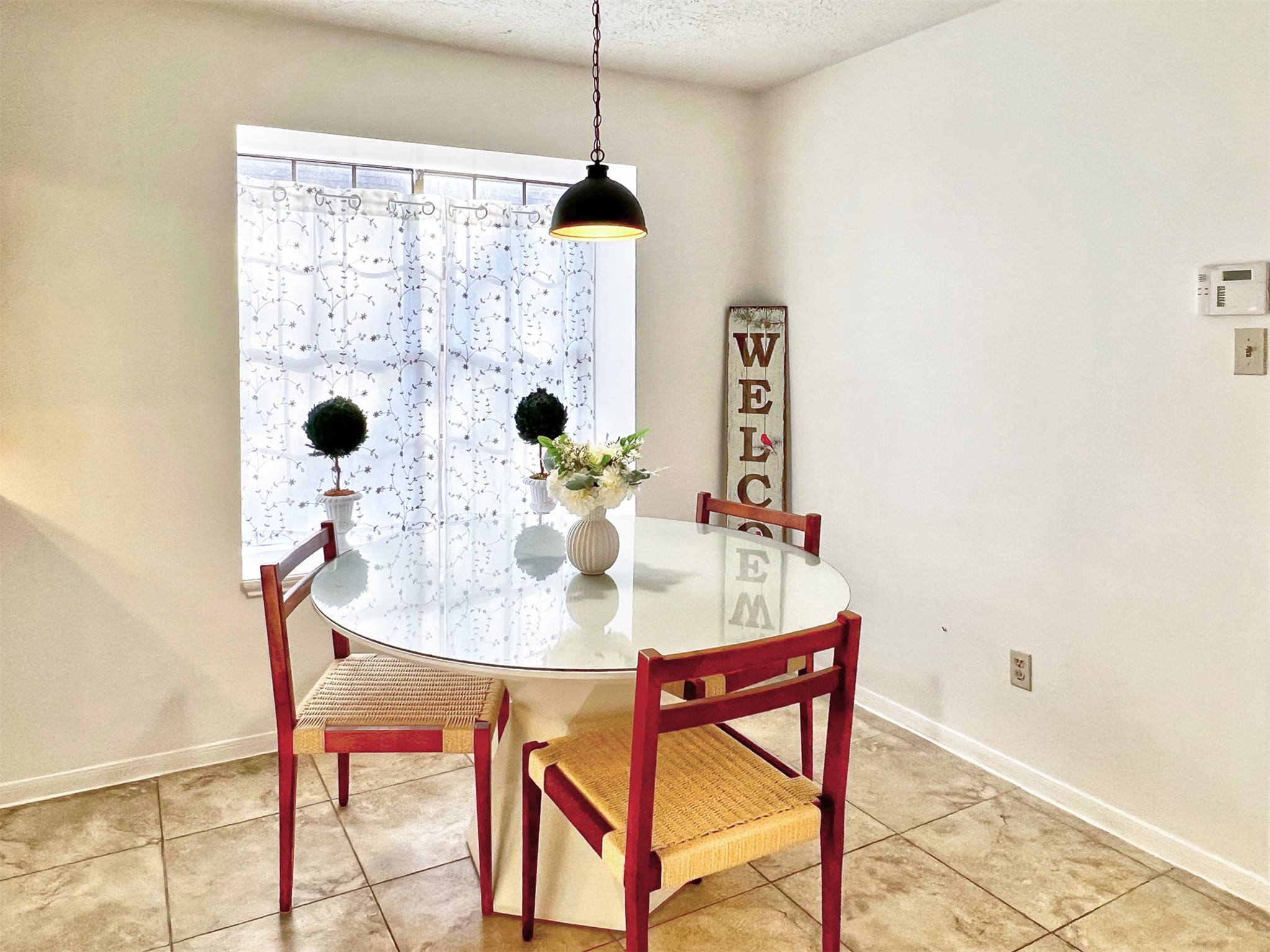 12510 Millvan Drive Houston, TX 77070 - Photo 28 of 46 a dining room with a table and chairs