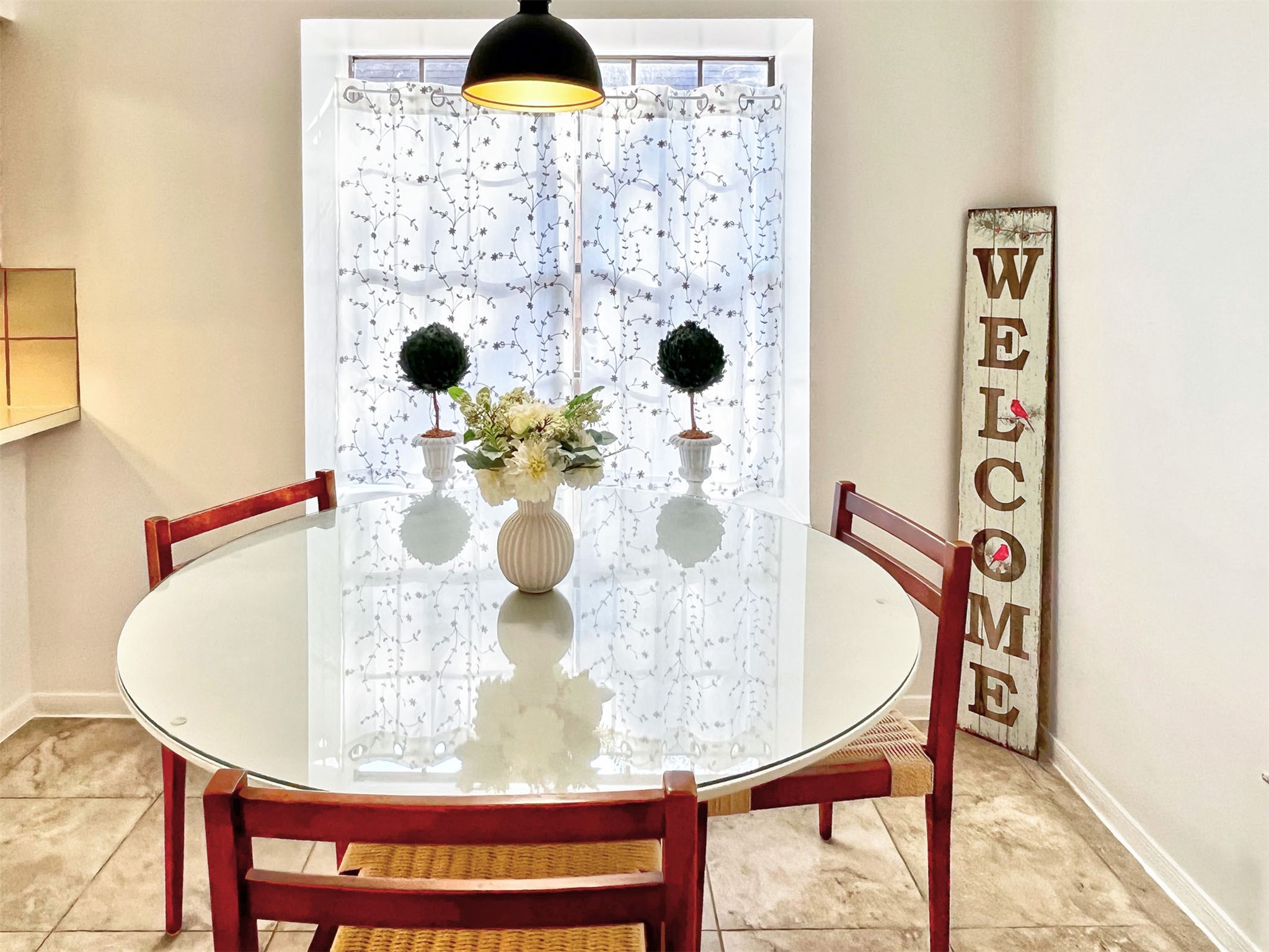 12510 Millvan Drive Houston, TX 77070 - Photo 29 of 46 a view of a dining room with furniture and wooden floor