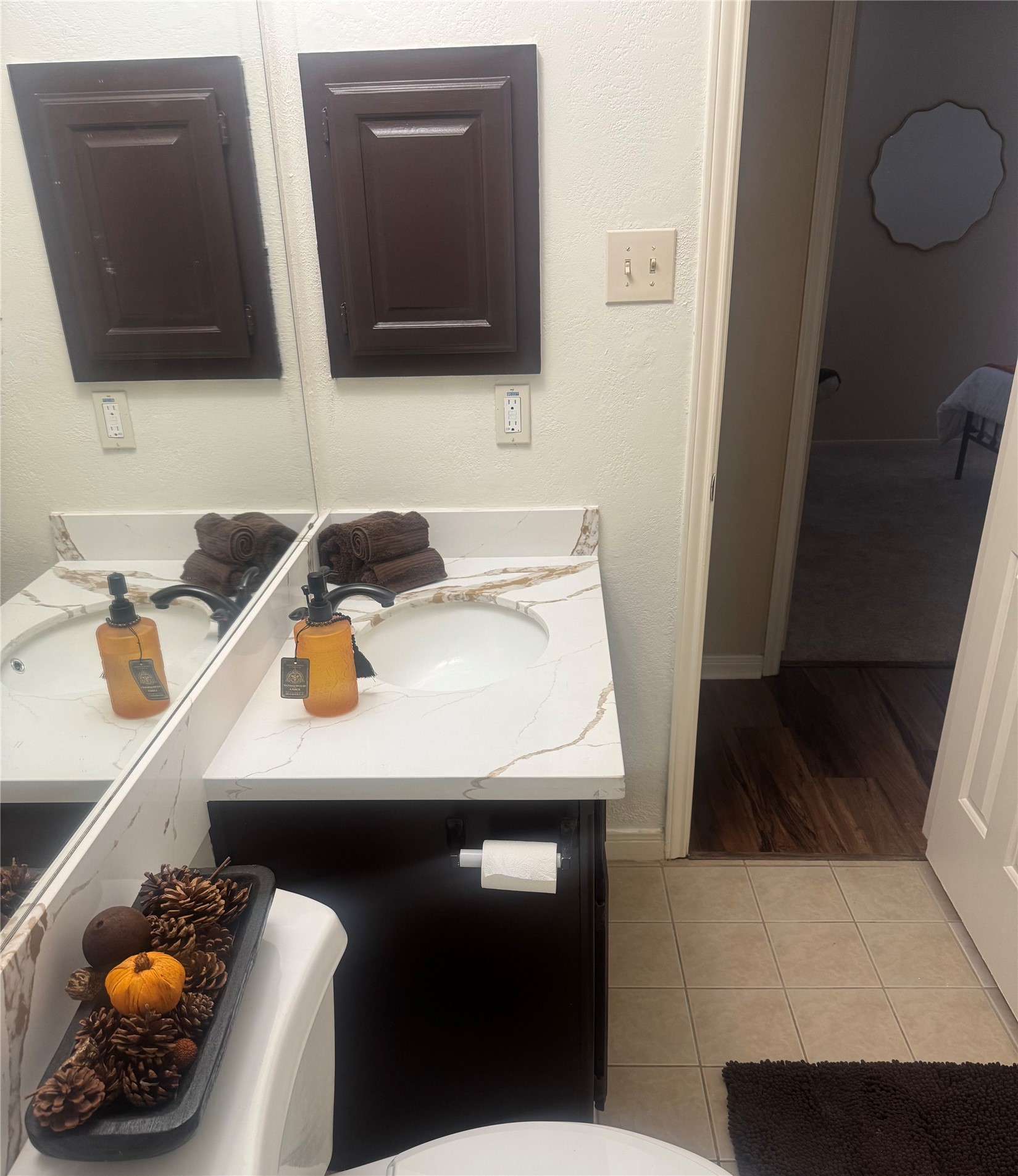 12510 Millvan Drive Houston, TX 77070 - Photo 45 of 46 a bathroom with a sink and a mirror