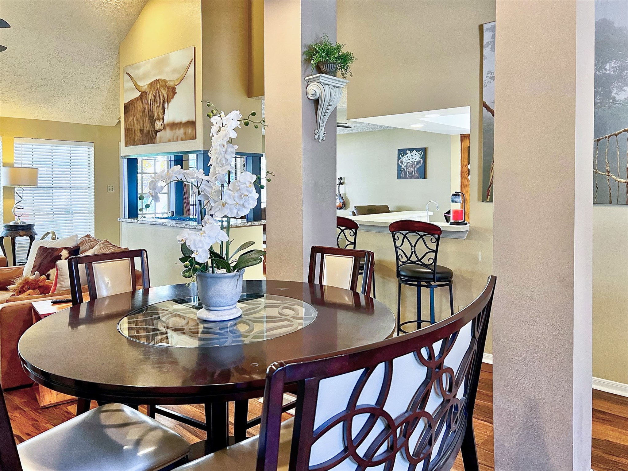 12510 Millvan Drive Houston, TX 77070 - Photo 8 of 46 a view of a dining room with furniture and wooden floor