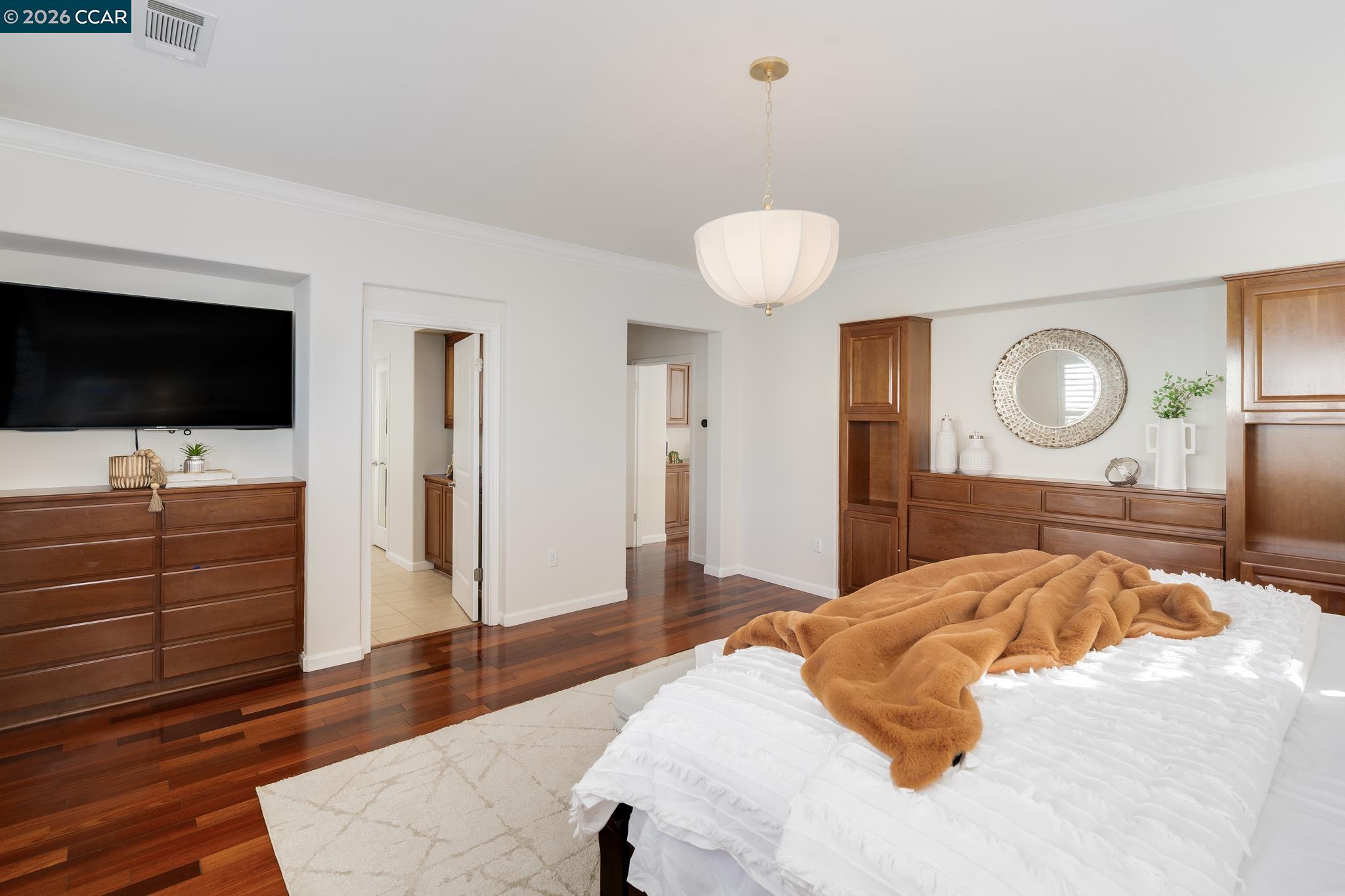 3138 Ashbrook Lane San Ramon, CA 94582 - Photo 16 of 27 a bedroom with a bed and wooden floor