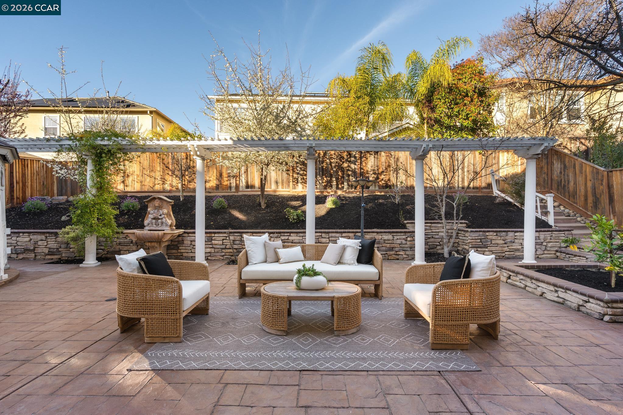 3138 Ashbrook Lane San Ramon, CA 94582 - Photo 23 of 27 a building outdoor space with patio furniture and potted plants