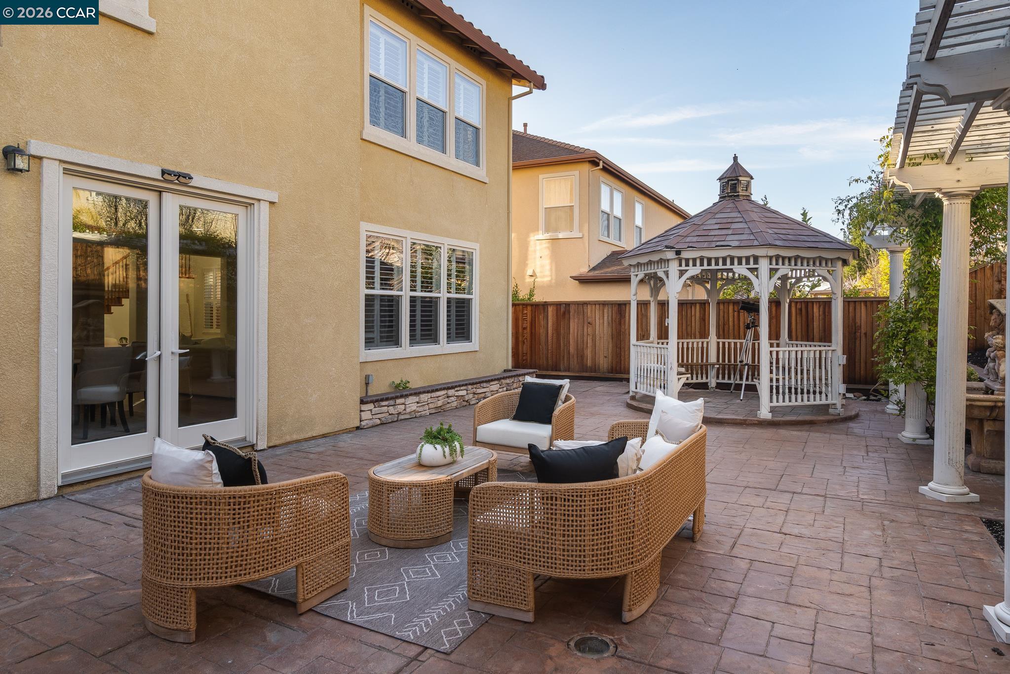 3138 Ashbrook Lane San Ramon, CA 94582 - Photo 25 of 27 a building outdoor space with patio furniture and potted plants