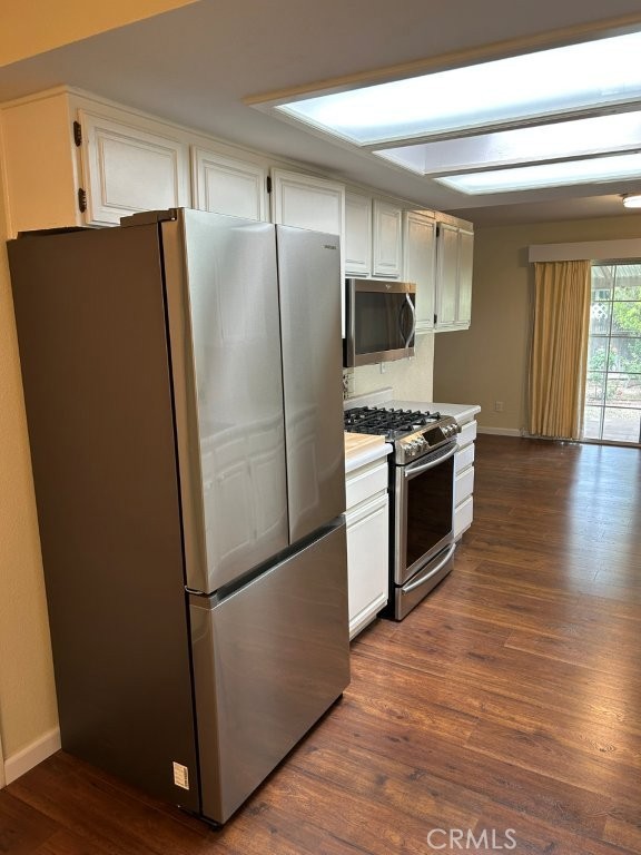 1743 Northview Place Paso Robles, CA 93446 - Photo 11 of 26 a kitchen with stainless steel appliances a refrigerator and a wooden floor